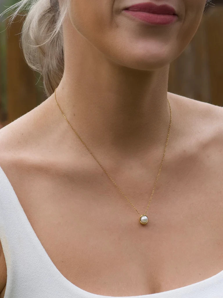 Enamored Pearl Necklace in gold by Farrah B