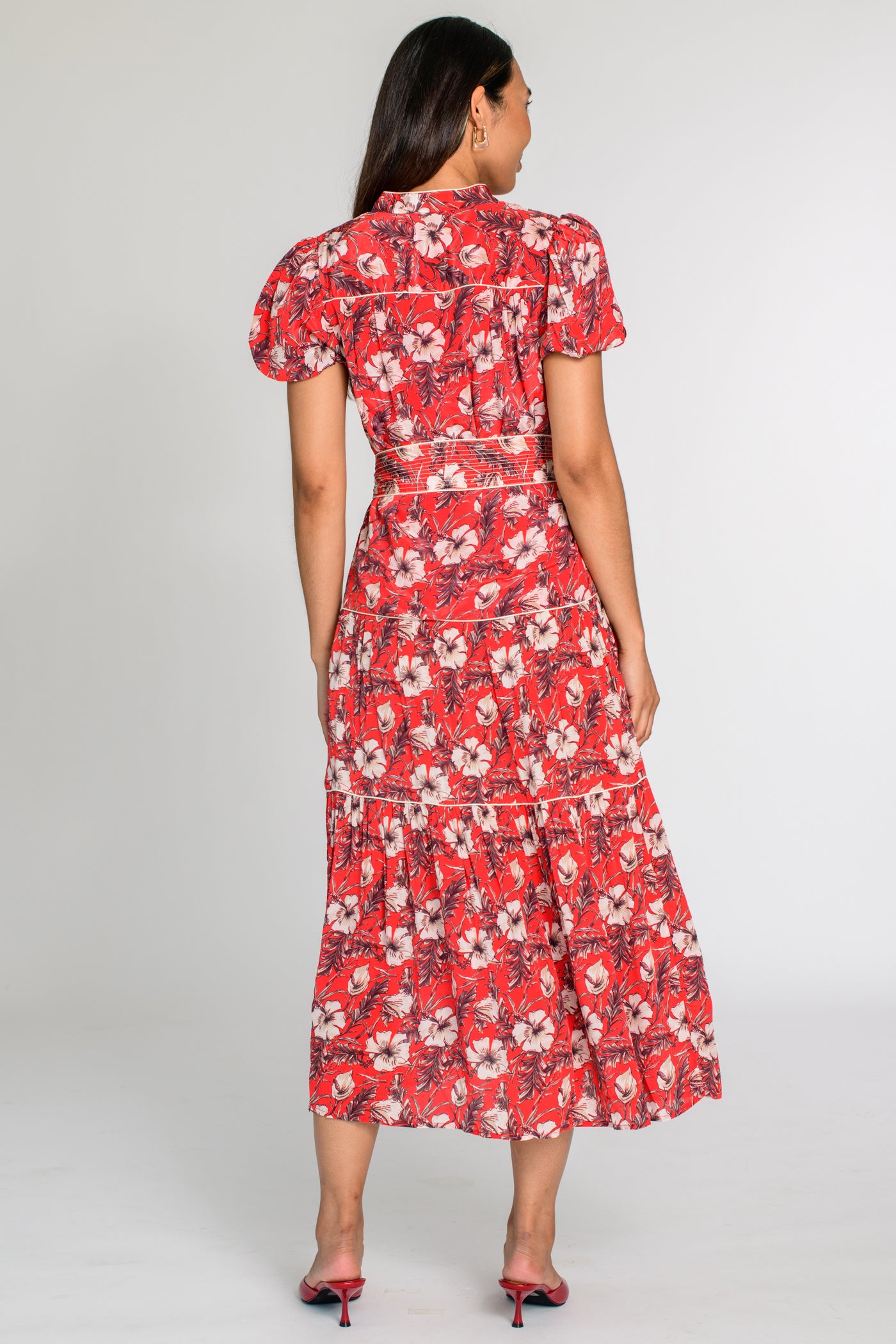 Model wearing springtime midi dress women's contemporary boutique