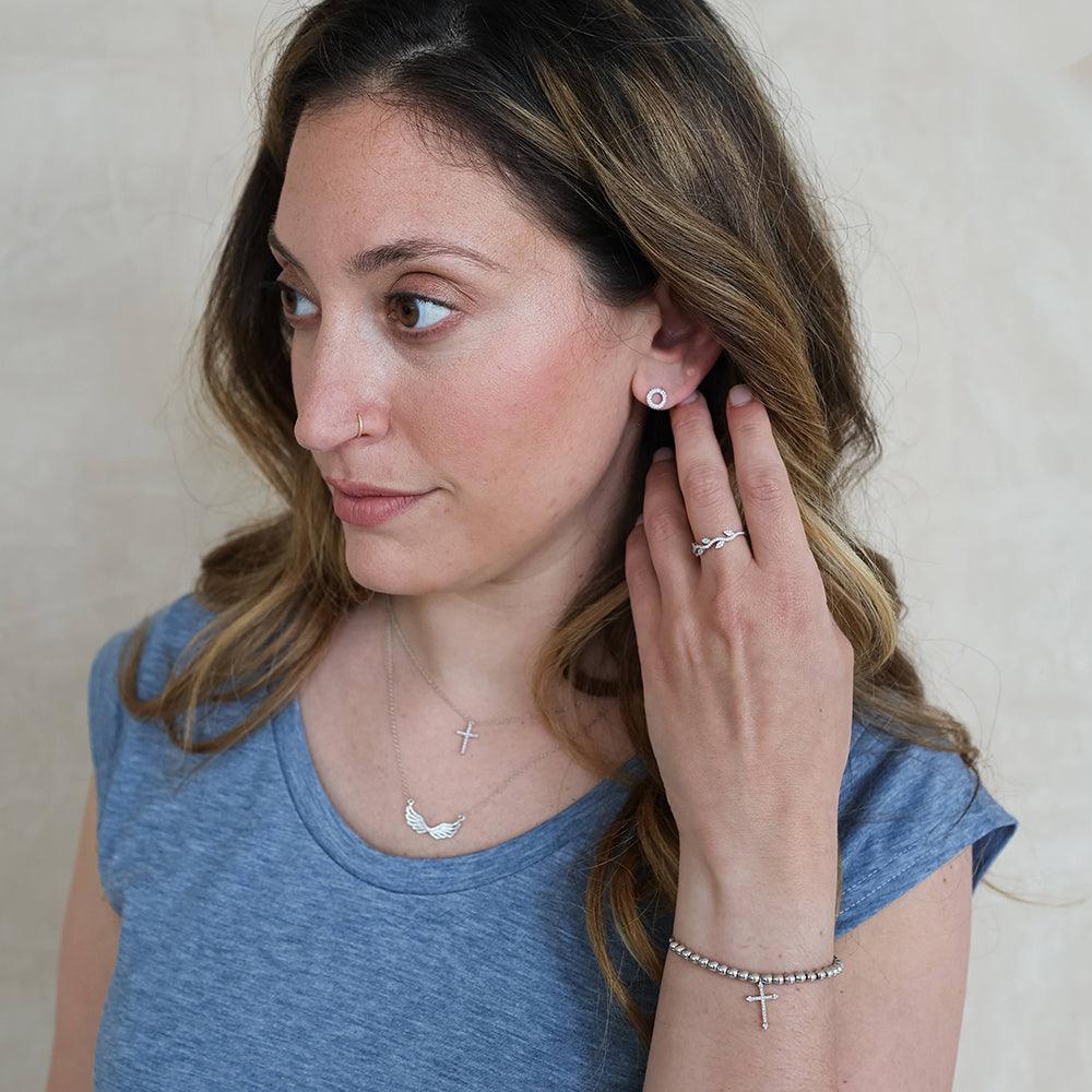 Believe Cross Pendant Necklace in gold by Ella Stein