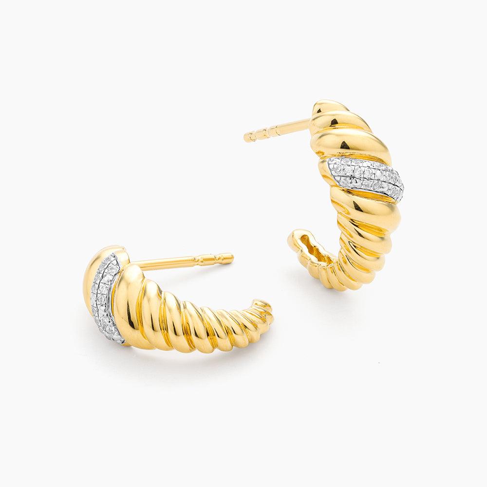 Croissant Dome Huggie Earrings in gold by Ella Stein