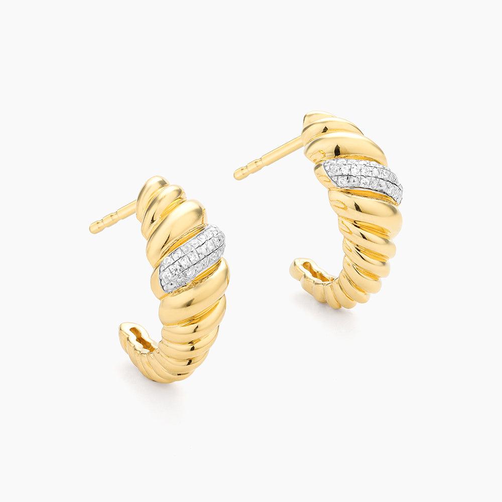 Croissant Dome Huggie Earrings in gold by Ella Stein