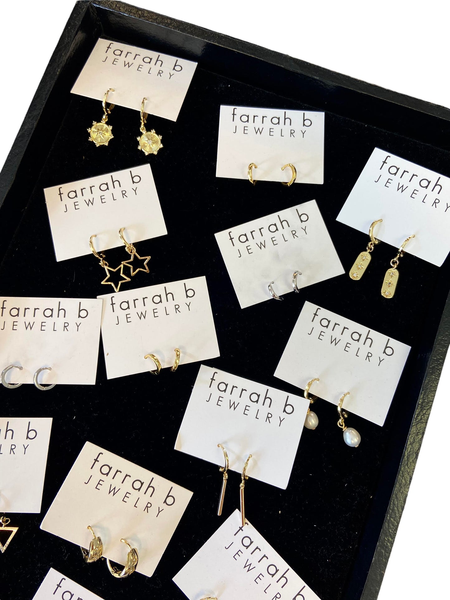 Minimalist Mini Huggies in gold by Farrah B