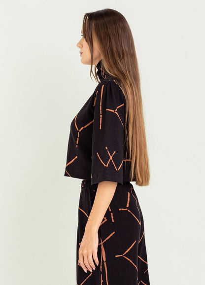 Batna Mock Neck Top in black stix by Bel Kazan