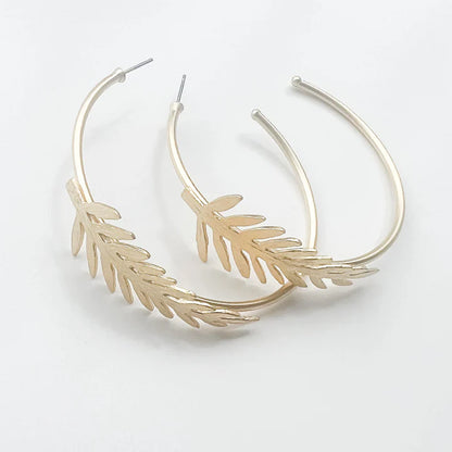 The Chelsea Hoop with Leaf Earring in gold by Virtue