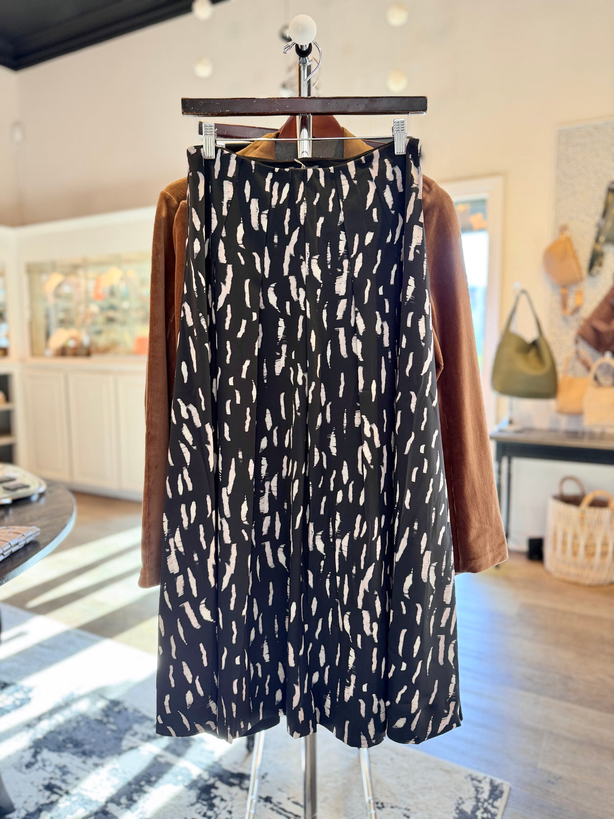 Hollis Pleated Midi Skirt in winter black shadow by Lysse