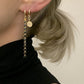 Coin Huggies in gold by Farrah B