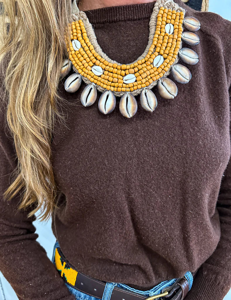 Cowrie Collar Necklace in orange by Twine & Twig