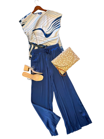 The Packable Pleated Palazzo Pant in capri blue by Lysse