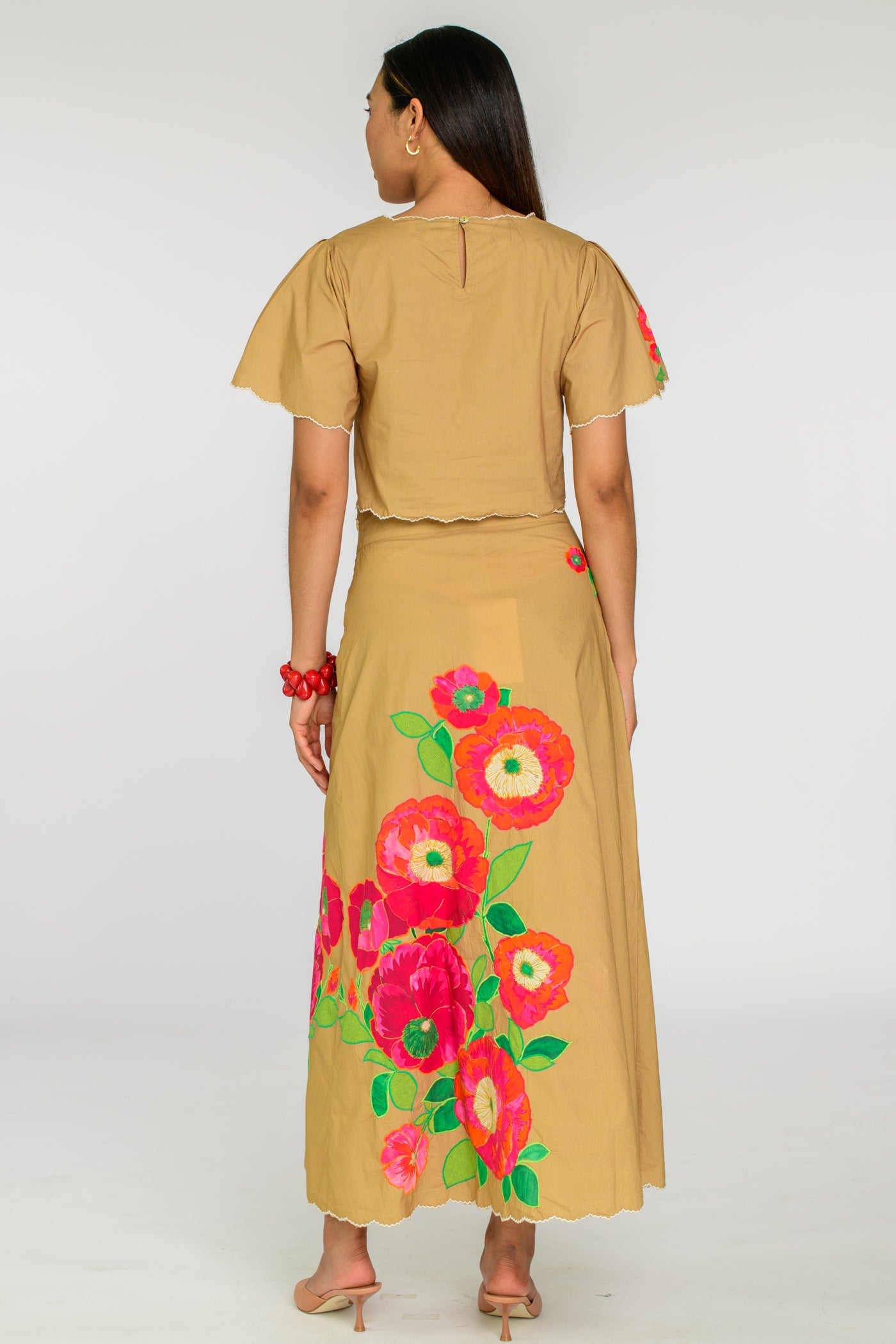 Model wearing Elizabeth James Paloma top and skirt 