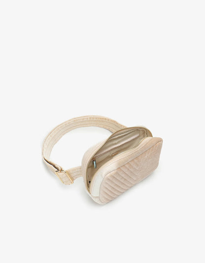 Aerin Velvet Quilted Belt Bag in cream by Remi & Reid