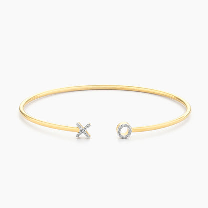 XO Flexi Cuff Bracelet in gold by Ella Stein