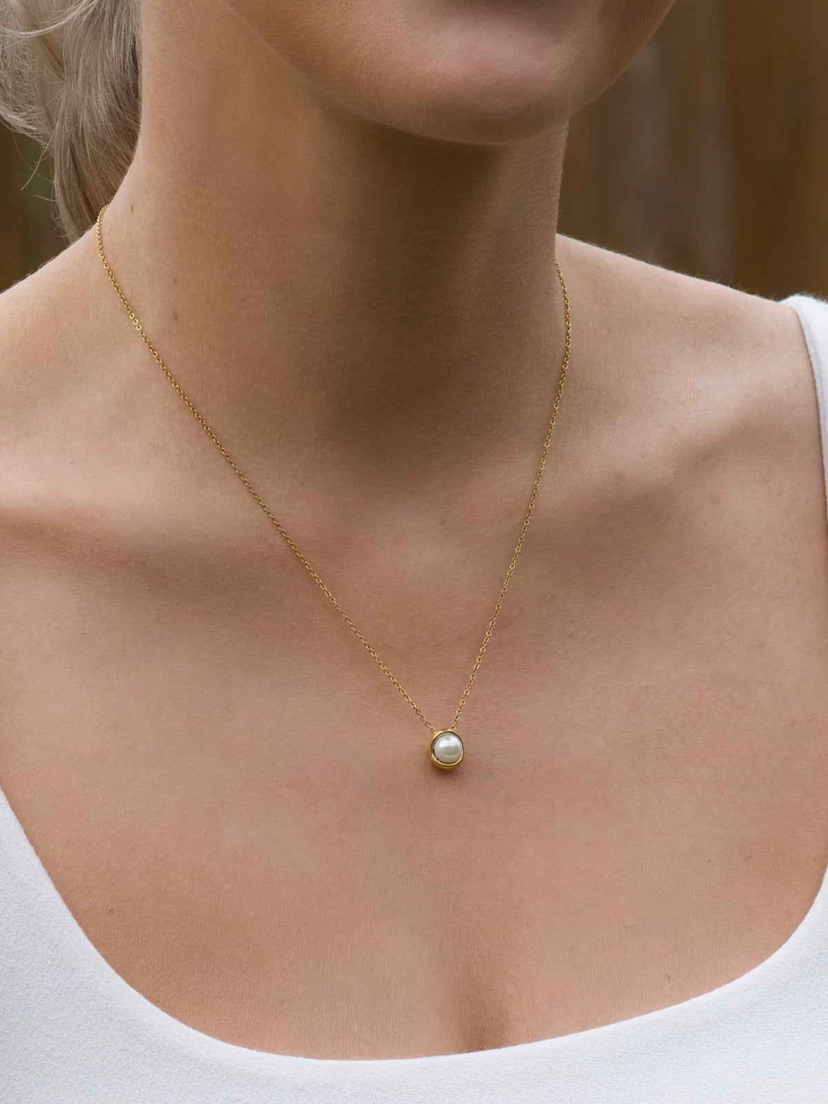 Enamored Pearl Necklace in gold by Farrah B