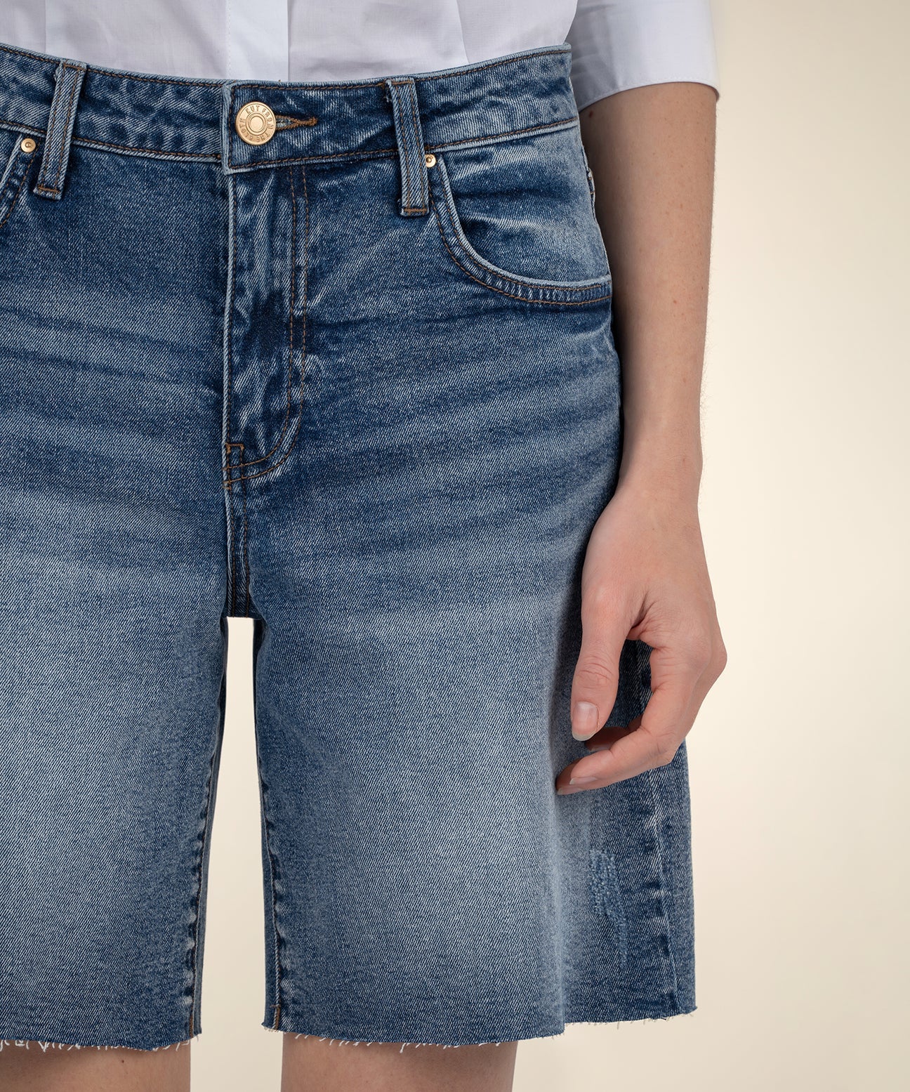 Hailey High Rise Short with Raw Hem in focus by KUT