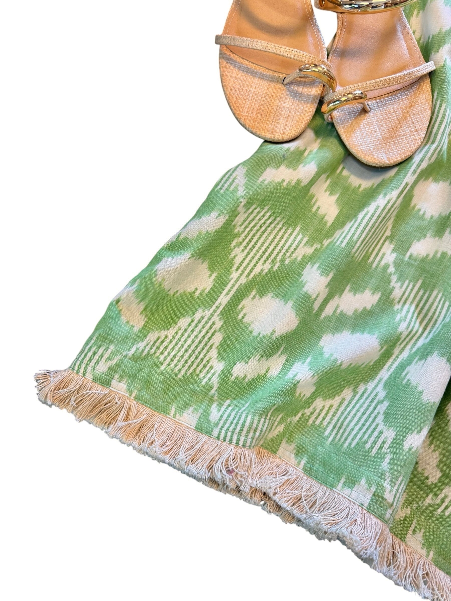 Close-up of fringe detail on women's beach dress