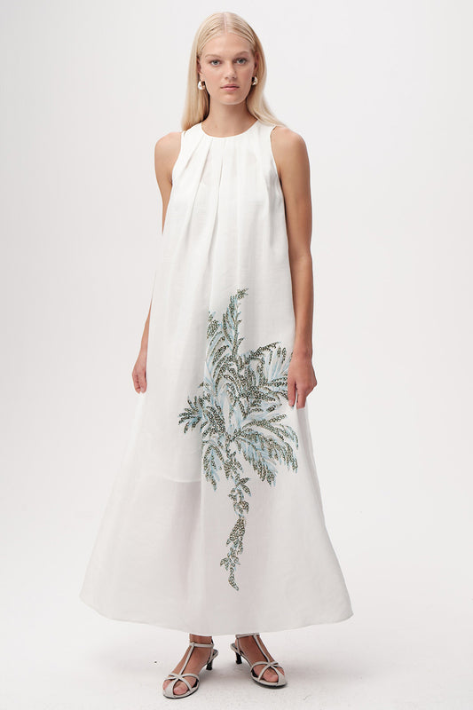 White sleeveless maxi dress with floral embellishment