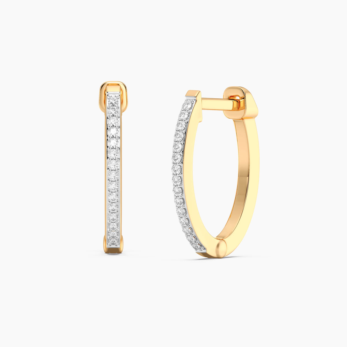 Slim Medium Pave Diamond Huggie Earring in gold by Ella Stein