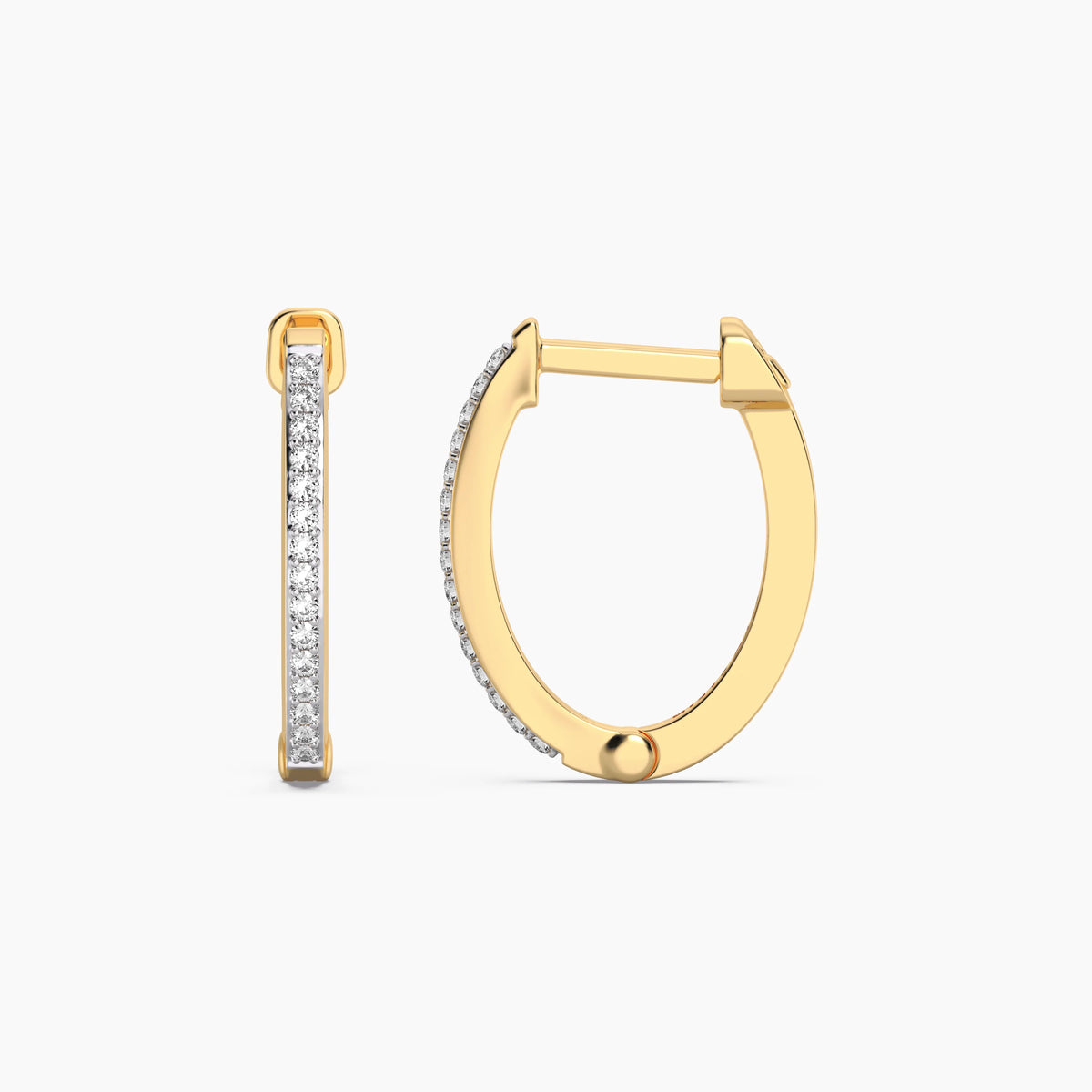 Slim Medium Pave Diamond Huggie Earring in gold by Ella Stein