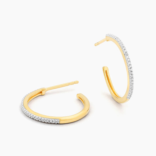 A Hoop Thing Small Hoop Earrings in gold by Ella Stein