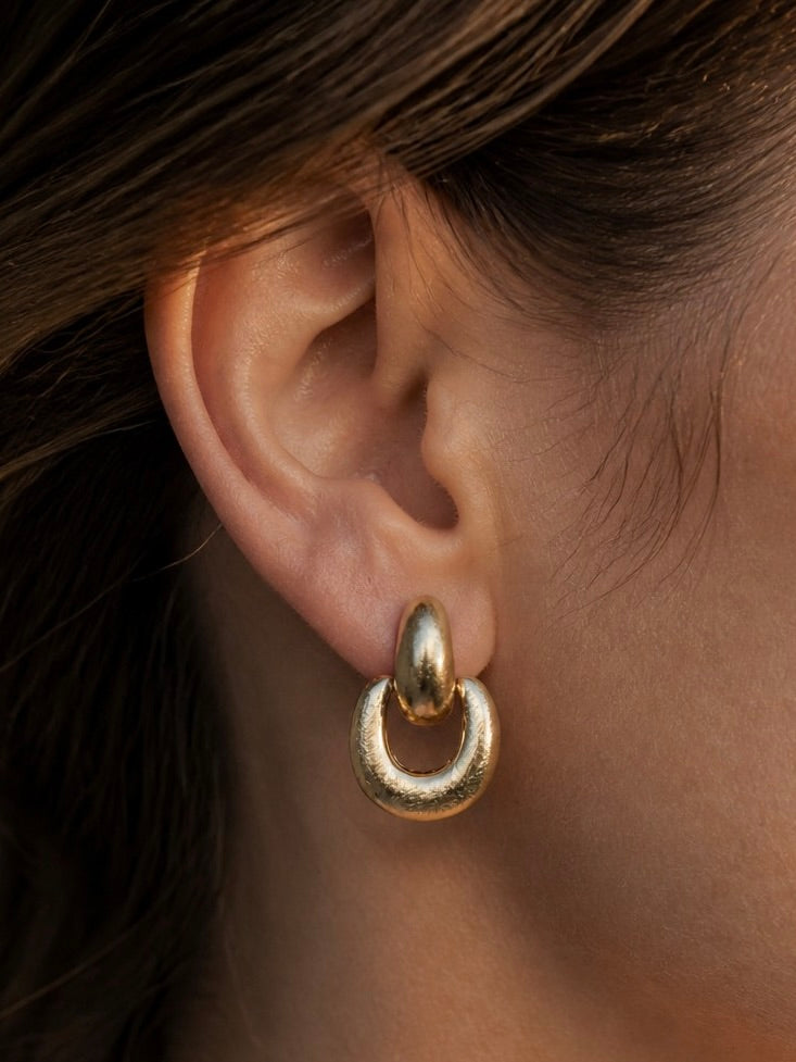 Knot Sorry Statement Earrings in gold by Farrah B