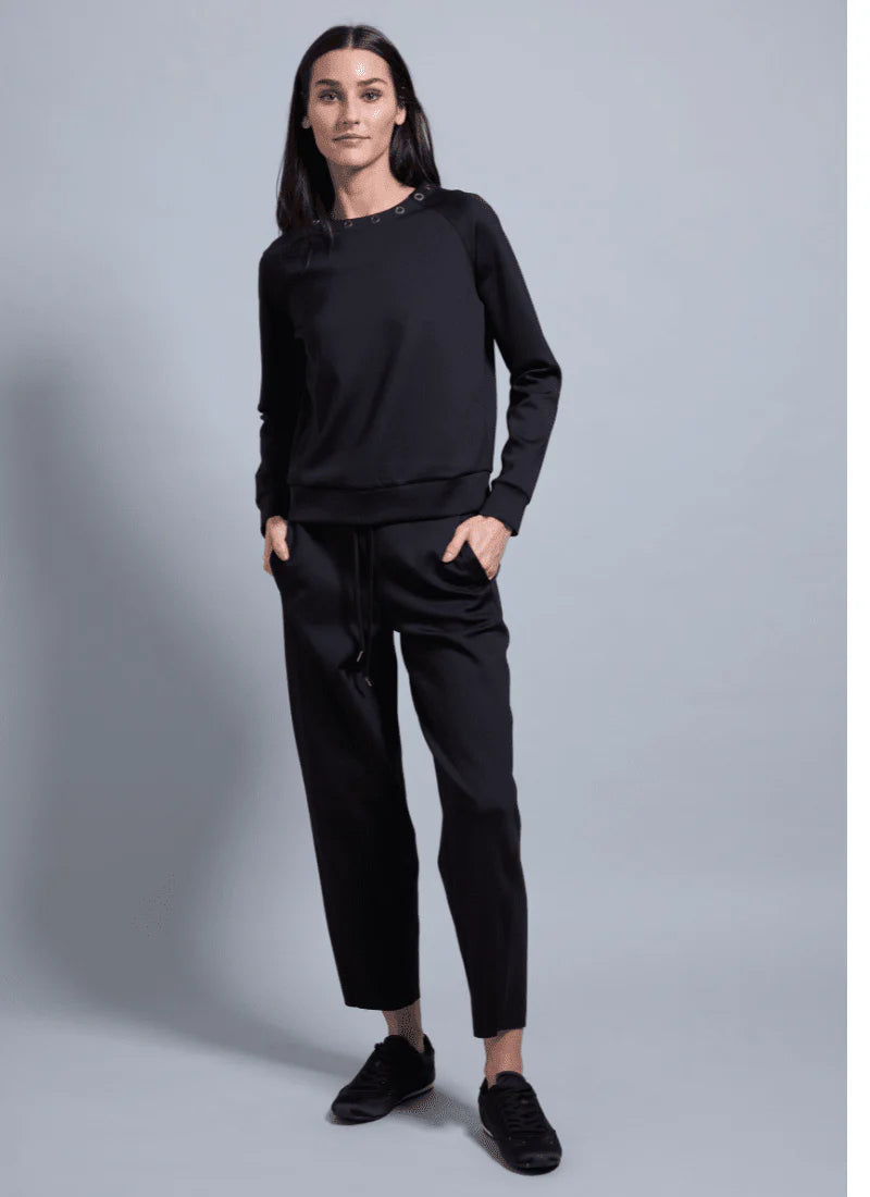 Desi Grommet Detail Neoprene Pullover in black by Lysse