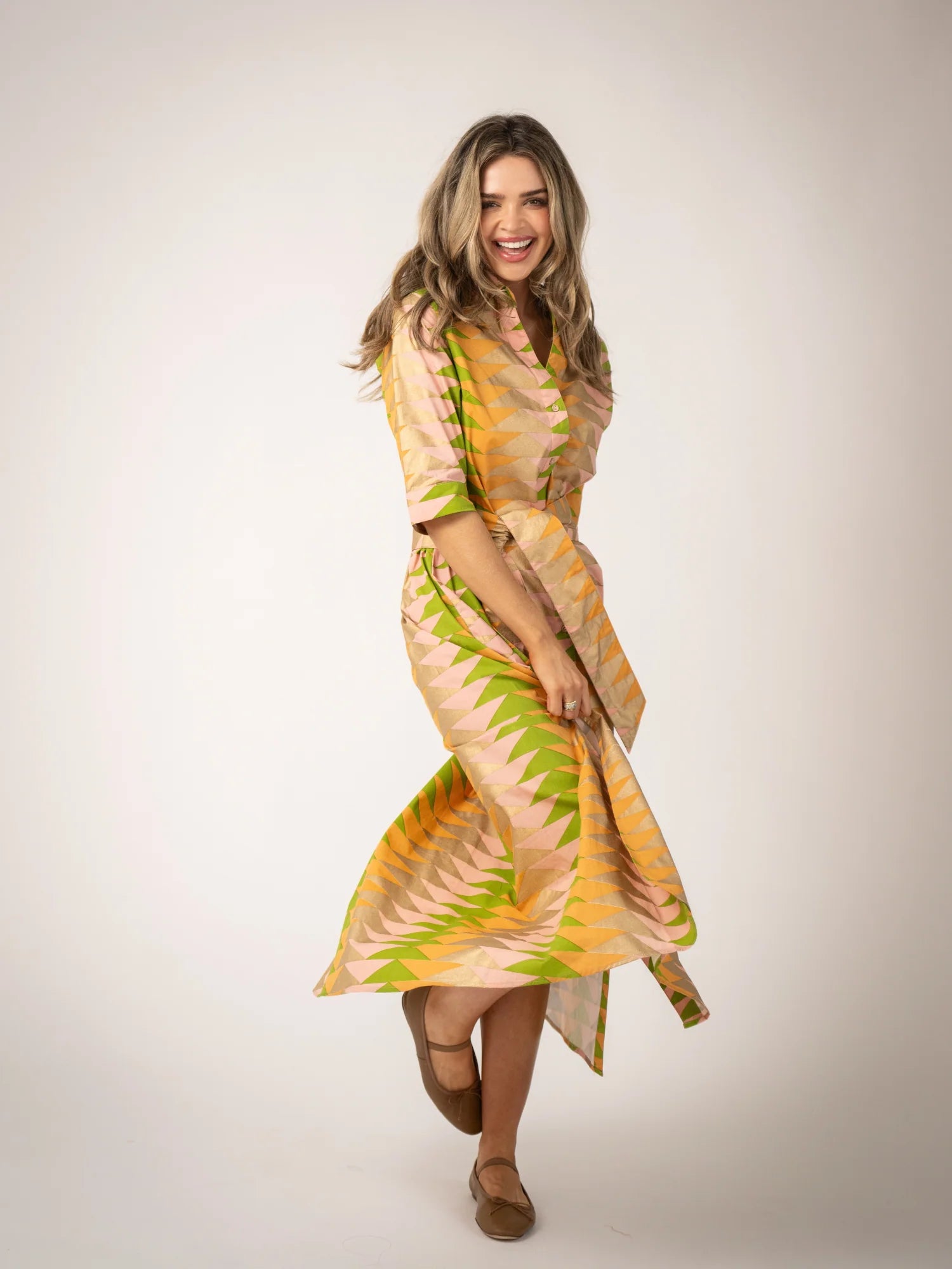 model wearing printed Eloise dress with fabric movement 