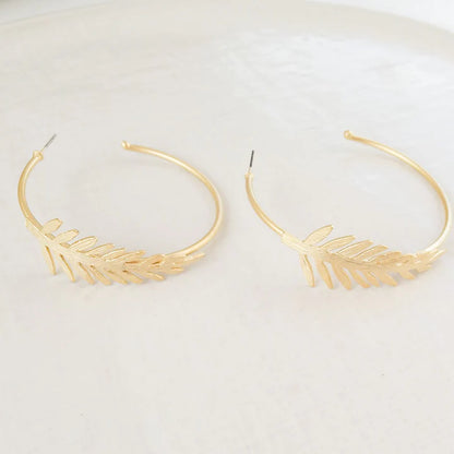 The Chelsea Hoop with Leaf Earring in gold by Virtue