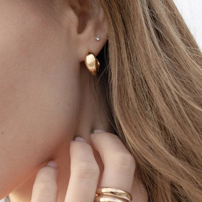 Karma Earrings in gold by Splash