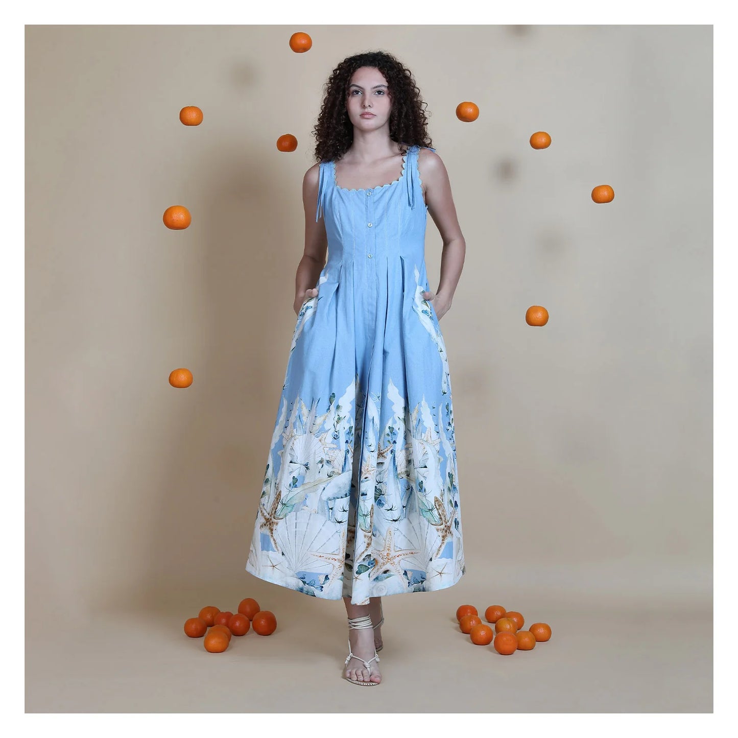 Model wearing blue cotton midi dress
