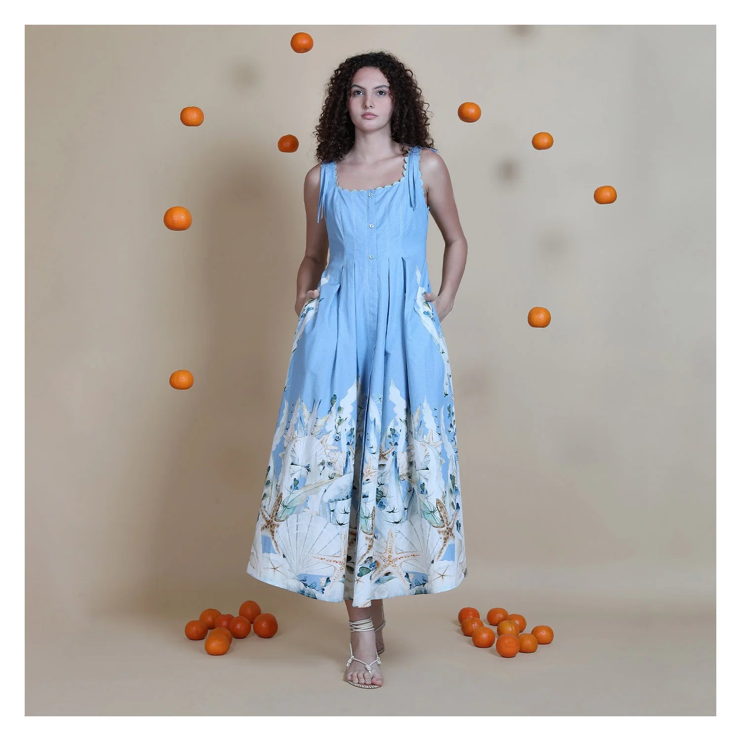 Model wearing blue cotton midi dress