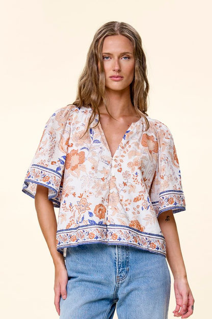 Model wearing cotton printed blouse front view