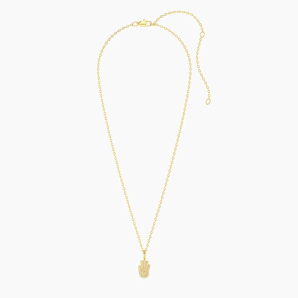 Sacred Hand Pendant Necklace in gold by Ella Stein