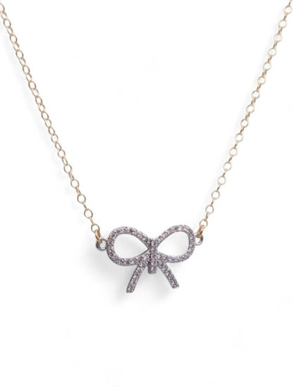 Prim & Proper Bow Necklace in gold by Farrah B