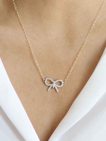 Prim & Proper Bow Necklace in gold by Farrah B