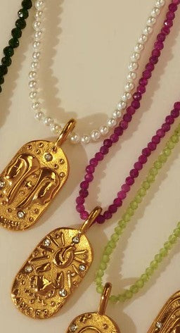 Sunrise Zodiac Necklaces in gold by Kozakh