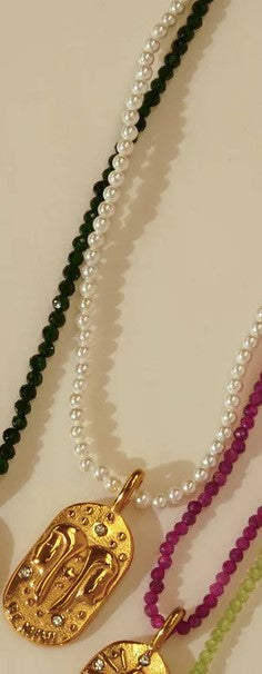 Sunrise Zodiac Necklaces in gold by Kozakh