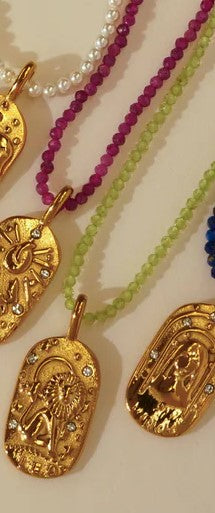 Sunrise Zodiac Necklaces in gold by Kozakh