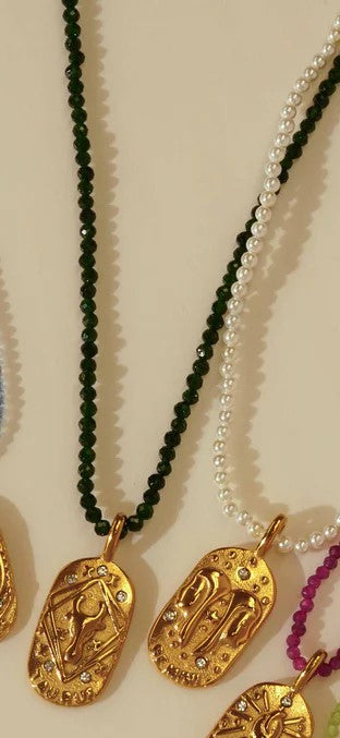 Sunrise Zodiac Necklaces in gold by Kozakh