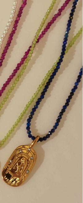 Sunrise Zodiac Necklaces in gold by Kozakh