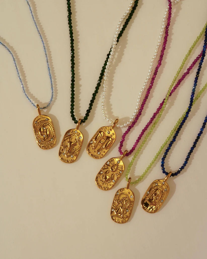 Sunrise Zodiac Necklaces in gold by Kozakh