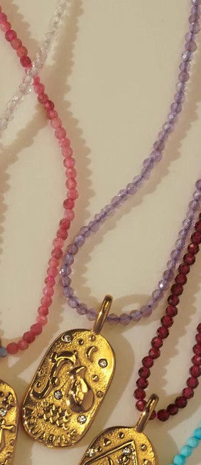 Sunrise Zodiac Necklaces in gold by Kozakh