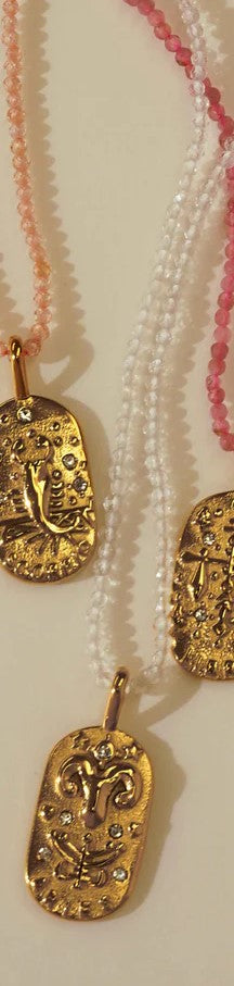Sunrise Zodiac Necklaces in gold by Kozakh