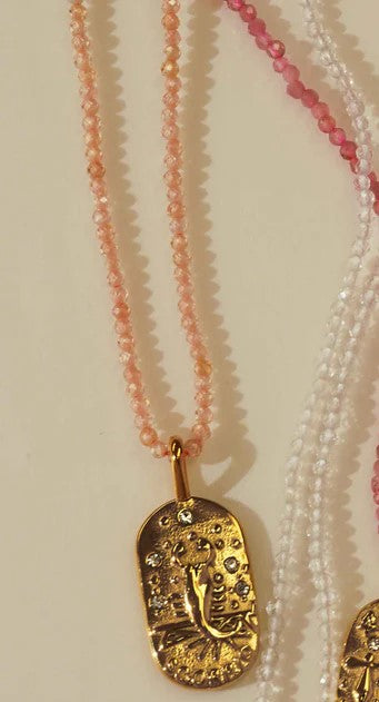 Sunrise Zodiac Necklaces in gold by Kozakh