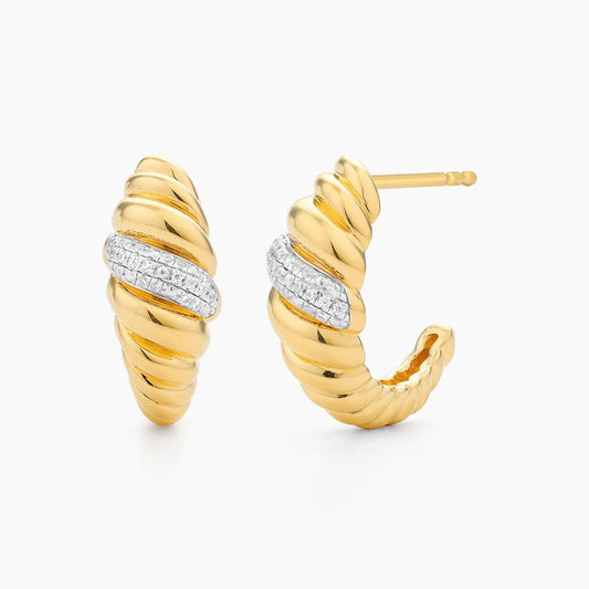 Croissant Dome Huggie Earrings in gold by Ella Stein