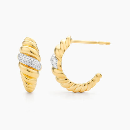 Croissant Dome Huggie Earrings in gold by Ella Stein