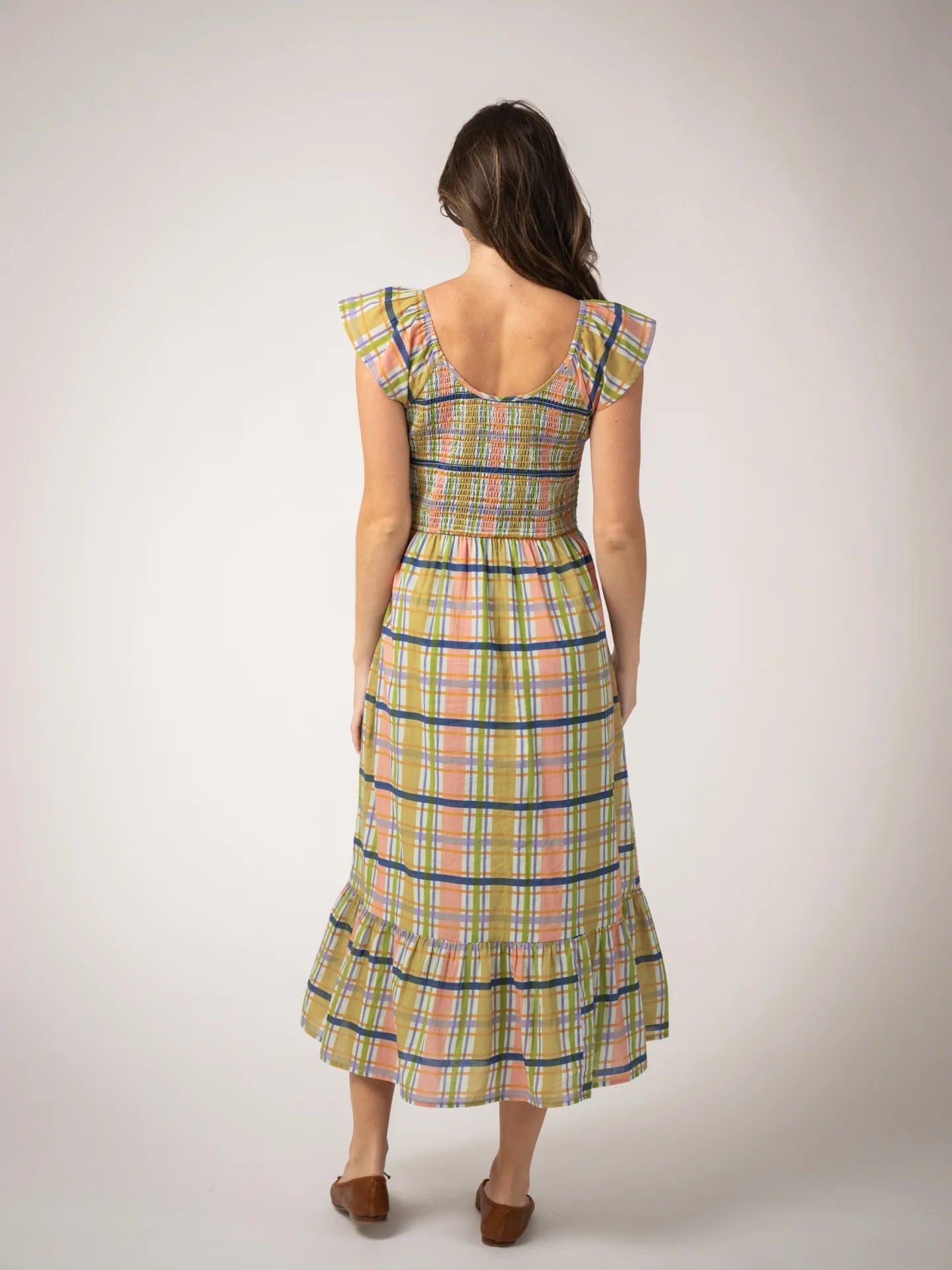 back view of plaid cotton midi dress with smocked bodice 