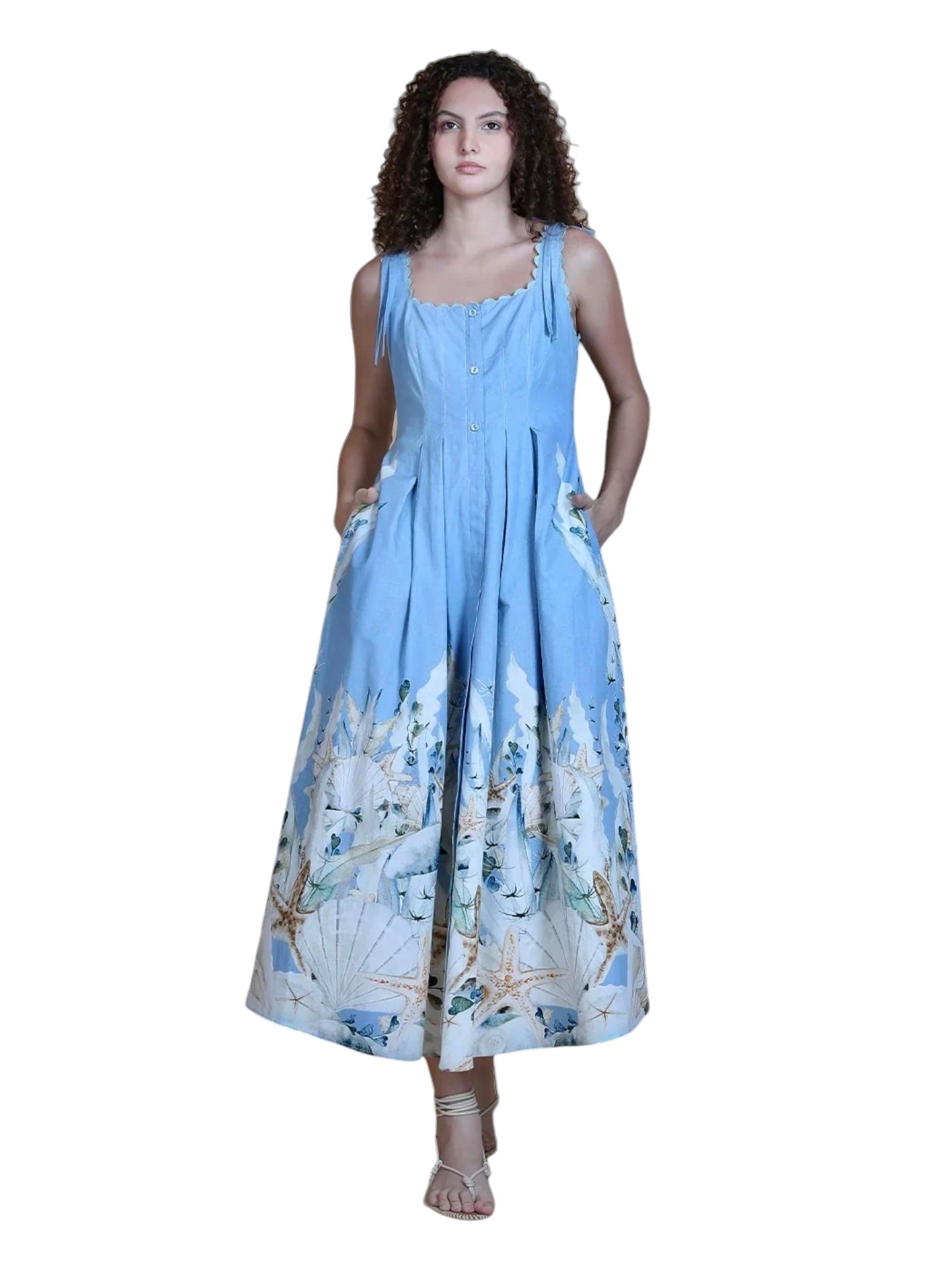 Model wearing blank london midi dress in blue print