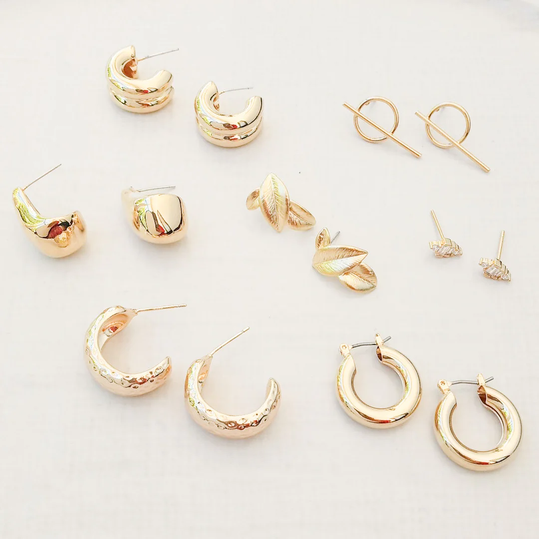 Small Shiny Teardrop Earring with CZ Sun Accents in gold by Virtue
