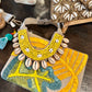Cowrie Collar Necklace in yellow by Twine & Twig