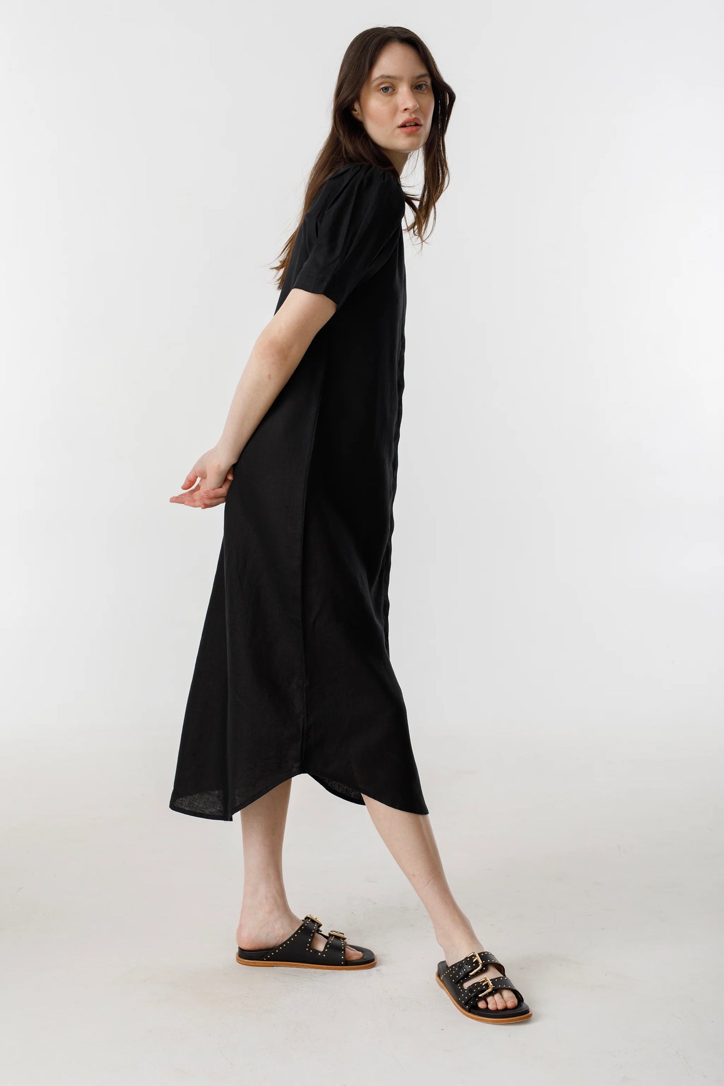 black linen midi dress styled with sandals 