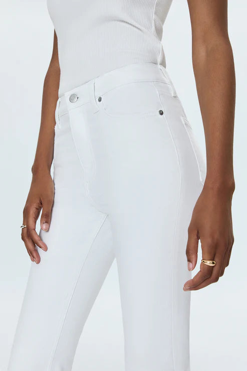 side view of model wearing lennon high rise crop bootcut jeans in vivid white by pistola